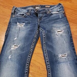 Distressed Blue Jeans